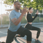 man and woman exercising and stretching