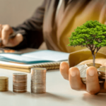 Person handing a tree with money over for lending for small business finances