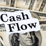 money with the words cash flow for small business finances