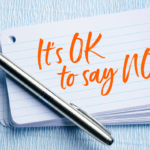 A note and pen that states, It's ok to say no"
